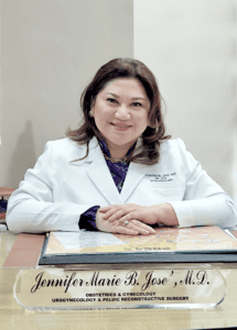 Dr. Jenny Jose sitting in a consultation room